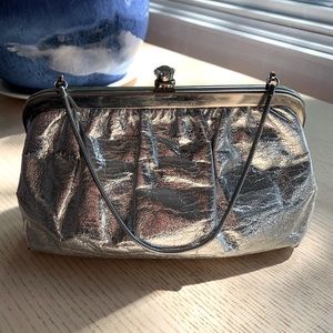 Very vintage evening clutch. Silver with rhinestone fastener